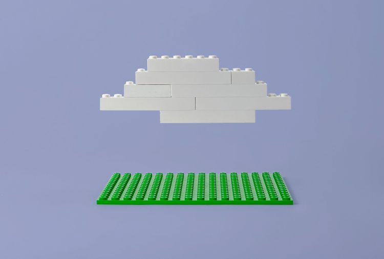 Lego cloud over green lego